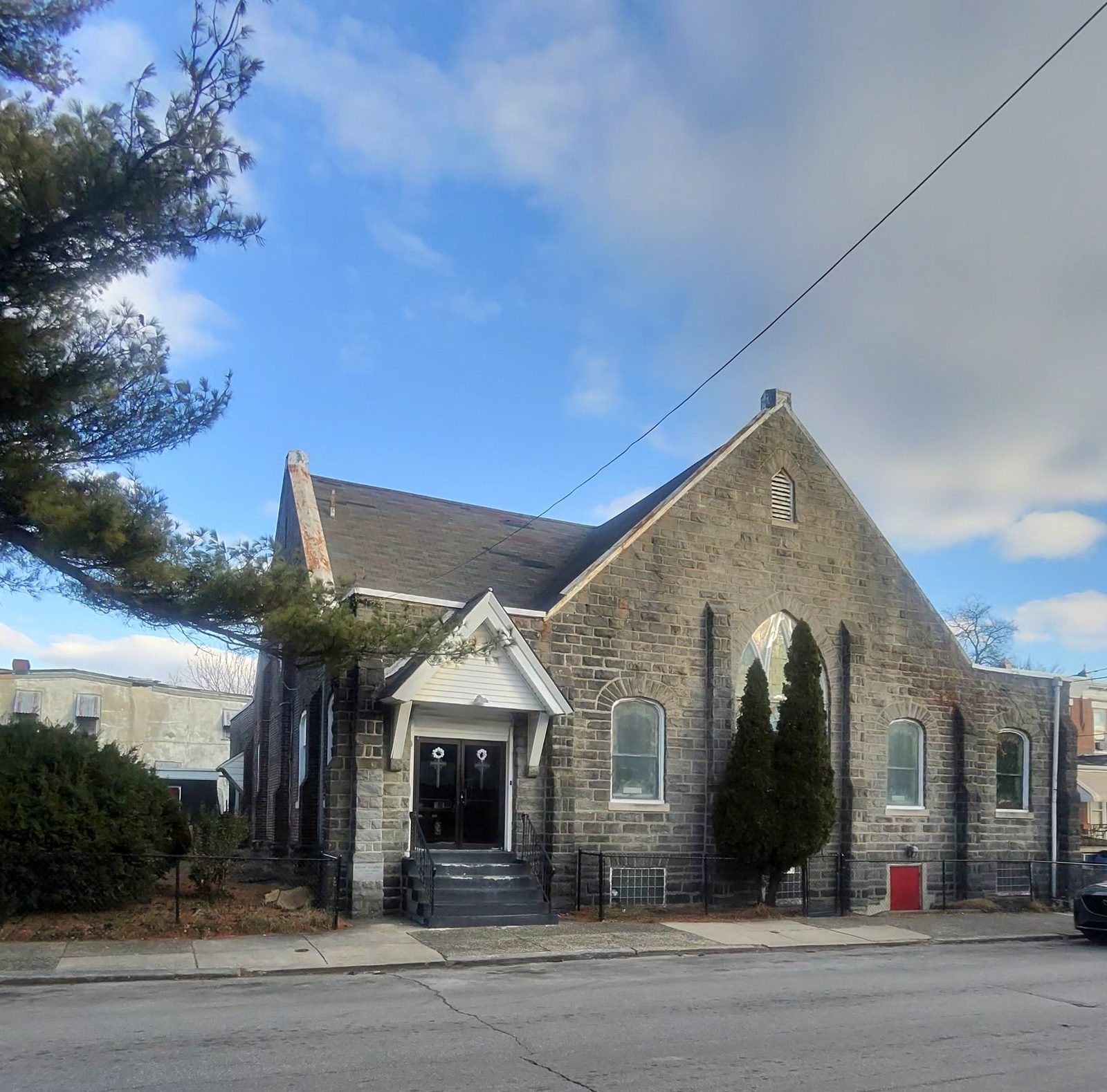 Alleyne Memorial A.M.E. Zion Church building exterior at 1249 N. 55th Street, Philadelphia, under a blue sky