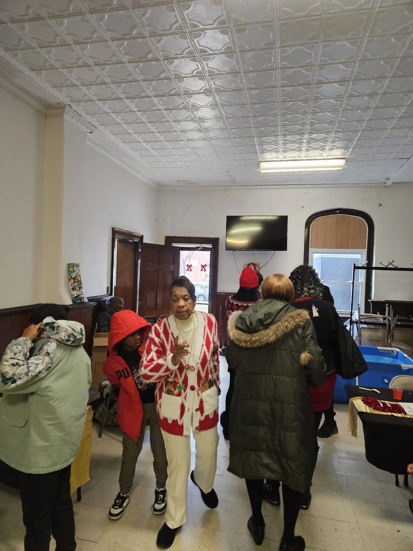 Members gathered in the fellowship hall during the holidays